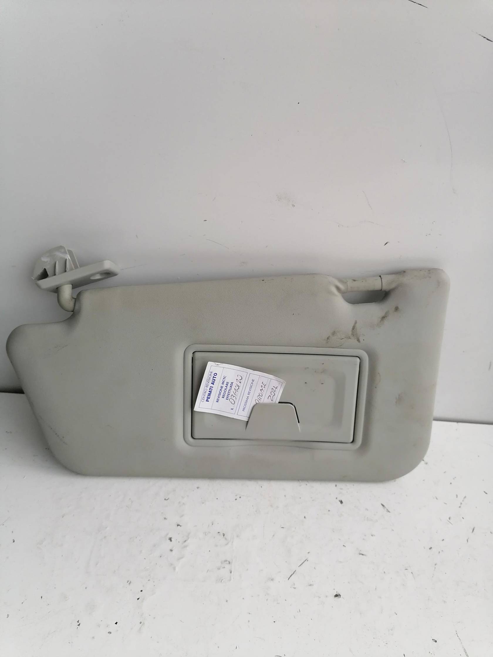 Aletta parasole parabrezza sx.